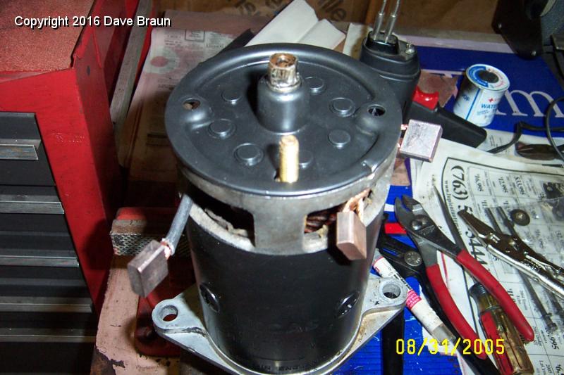 MGTD15470/Electrical/Starter & Generator/Brushes being positioned in